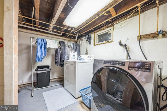 laundry room with washer and clothes dryer