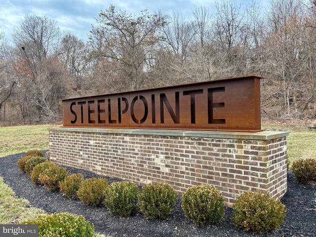 view of community sign