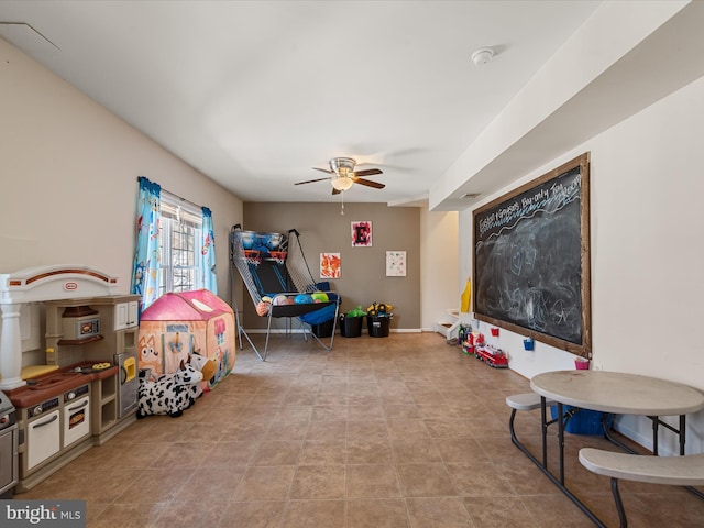 playroom featuring ceiling fan