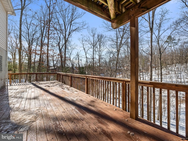 view of snow covered deck