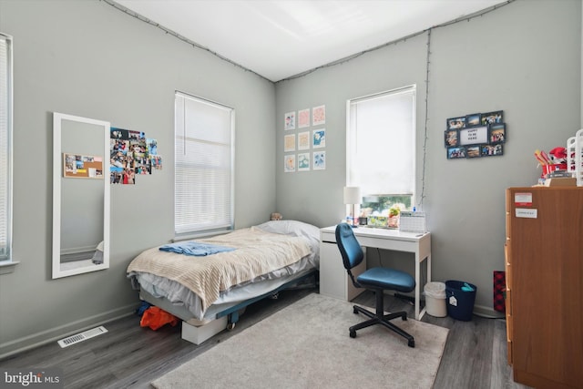 bedroom featuring hardwood / wood-style floors