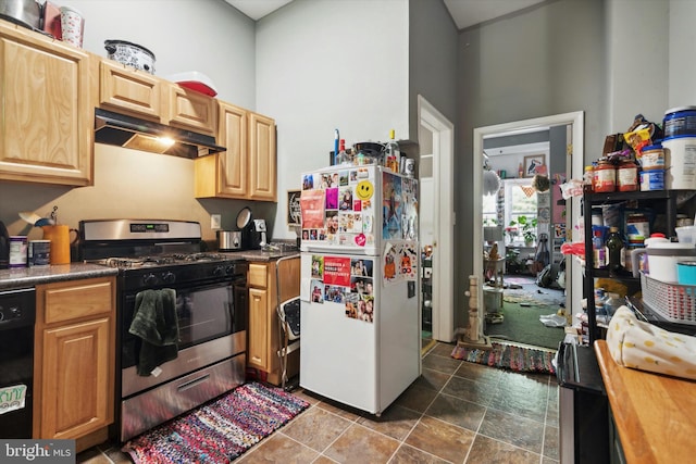 kitchen featuring white fridge, black dishwasher, and stainless steel range with gas cooktop