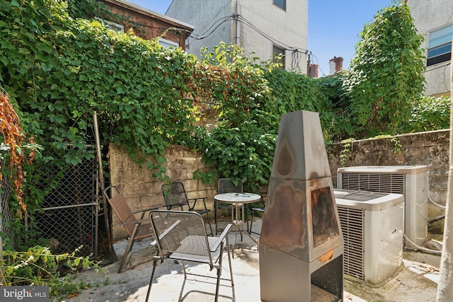 view of patio featuring central AC