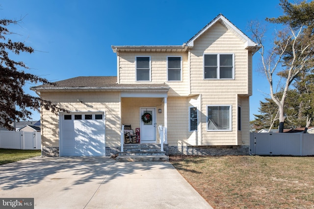 view of property with a front lawn and a garage