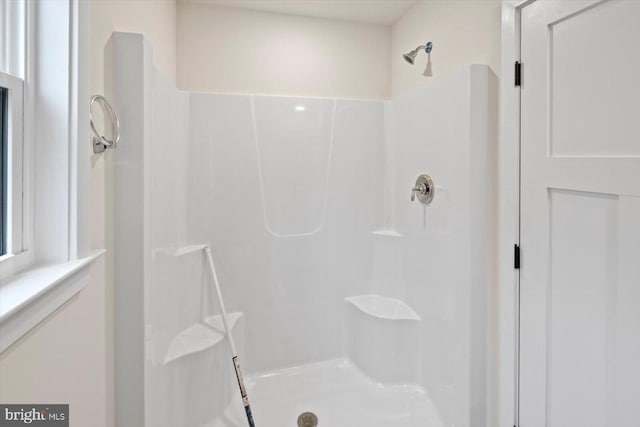 bathroom featuring a shower