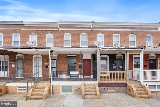 multi unit property featuring covered porch