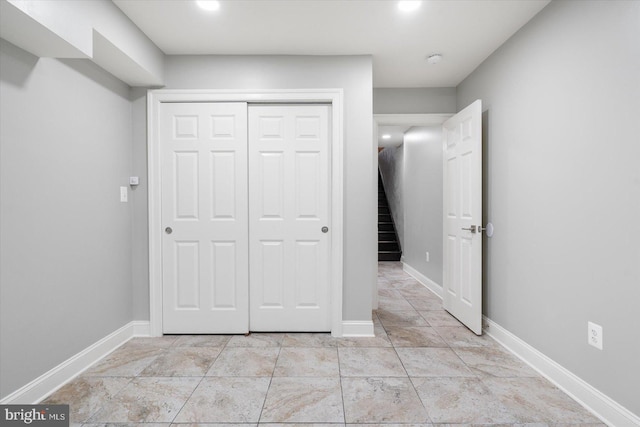 unfurnished bedroom with a closet