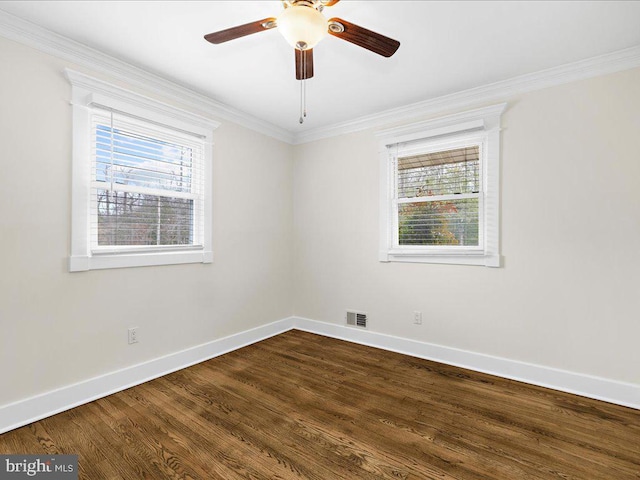 spare room with crown molding, ceiling fan, plenty of natural light, and wood-type flooring