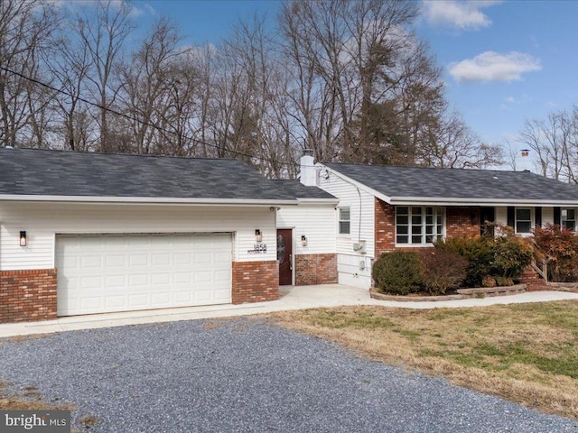 single story home with a garage