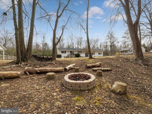 view of yard featuring a fire pit