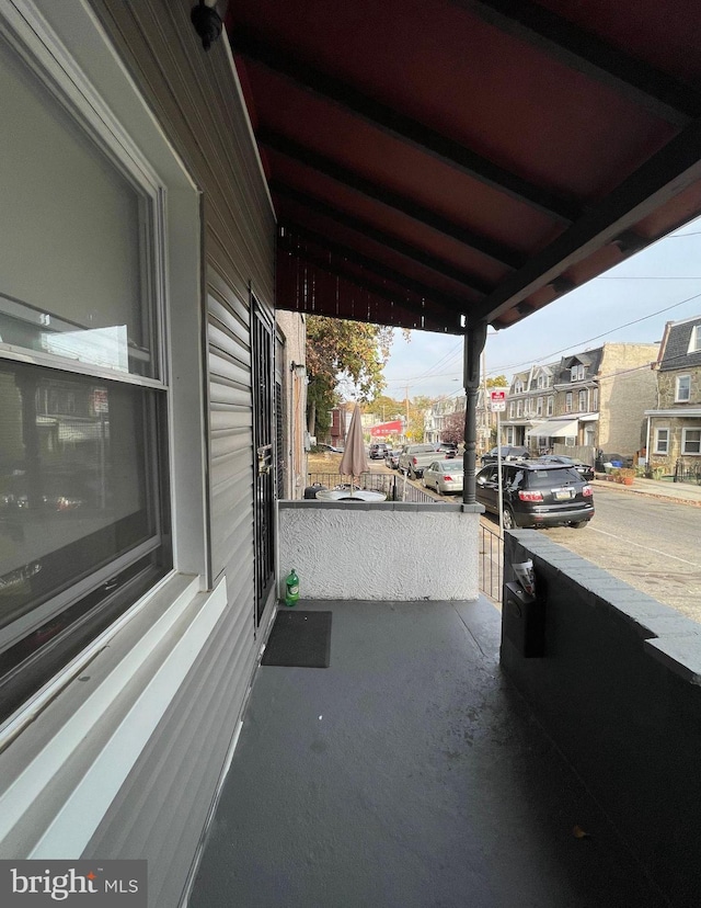 view of patio featuring a porch