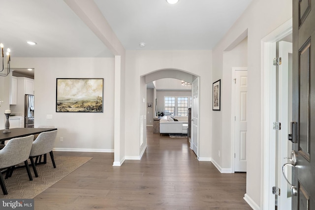 foyer entrance featuring dark hardwood / wood-style floors