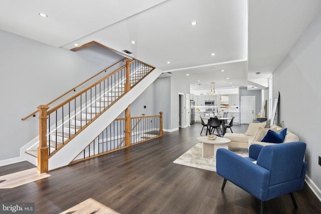 living room featuring dark hardwood / wood-style flooring