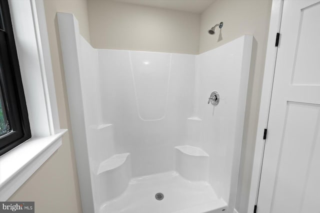 bathroom with walk in shower