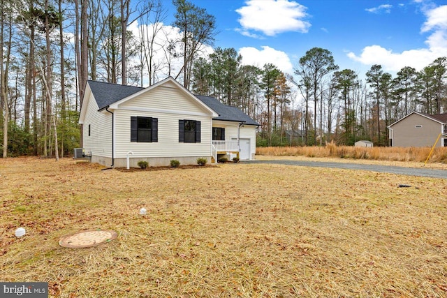 exterior space featuring central AC unit