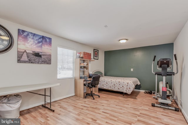 bedroom with light hardwood / wood-style floors