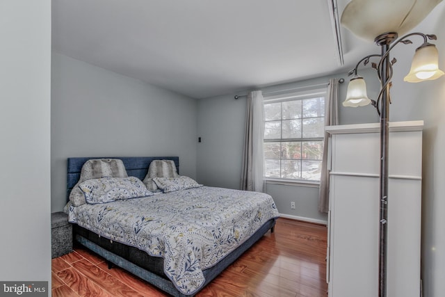 bedroom featuring wood-type flooring