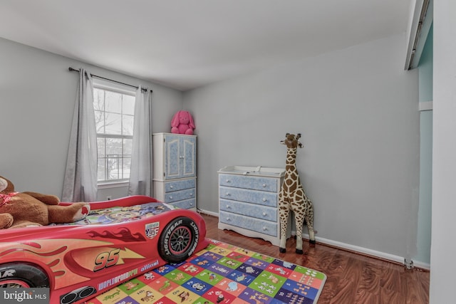 bedroom featuring dark hardwood / wood-style floors