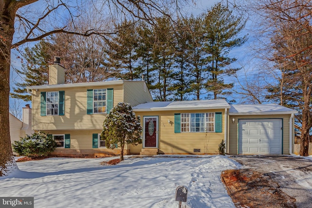 tri-level home featuring a garage