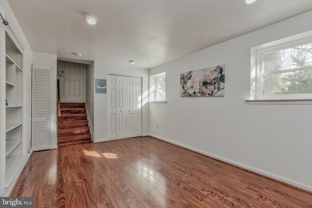 unfurnished bedroom with wood-type flooring