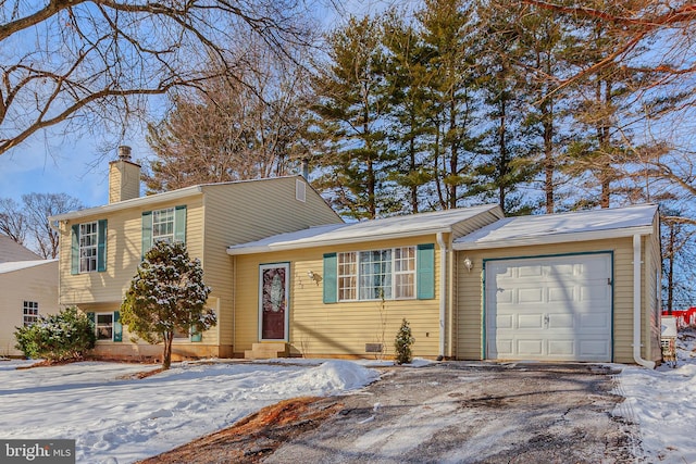 tri-level home with a garage