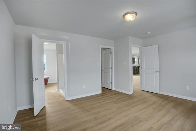 unfurnished bedroom with light hardwood / wood-style flooring