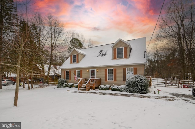 view of new england style home