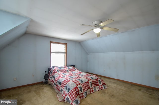 carpeted bedroom featuring ceiling fan and lofted ceiling