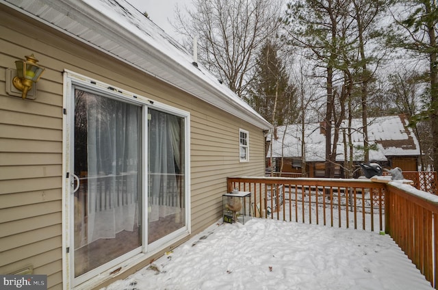 view of snow covered deck