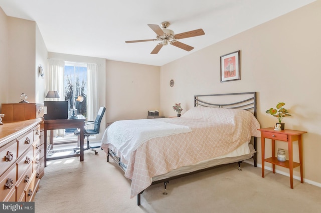 bedroom with light carpet and ceiling fan