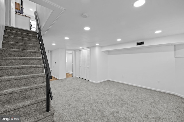 basement with carpet floors