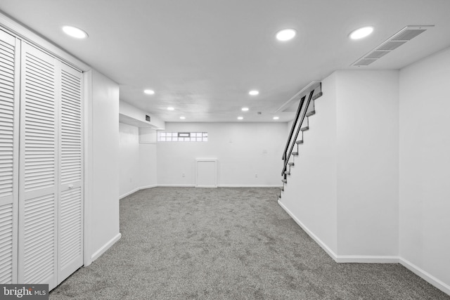 basement with carpet flooring