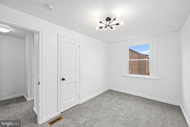 unfurnished bedroom with light carpet