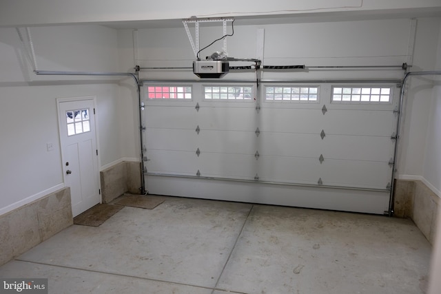 garage featuring a garage door opener