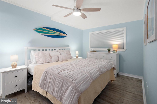 bedroom featuring dark hardwood / wood-style flooring and ceiling fan