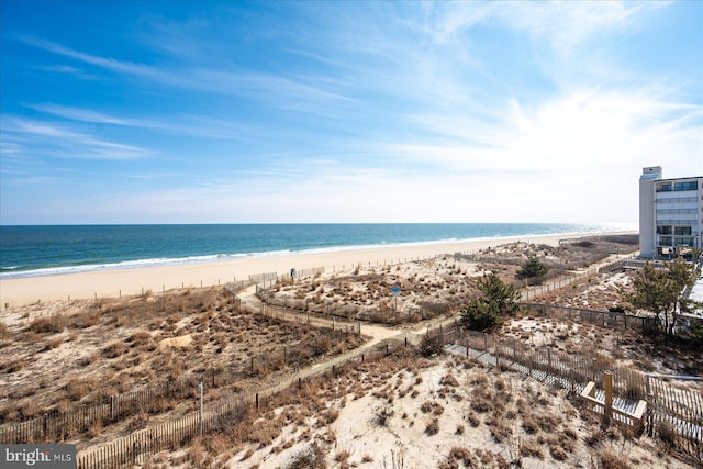 view of water feature with a beach view