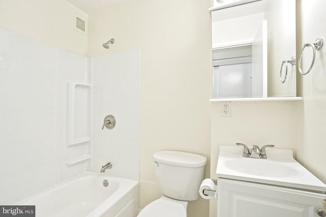 full bathroom with toilet, vanity, and shower / tub combination