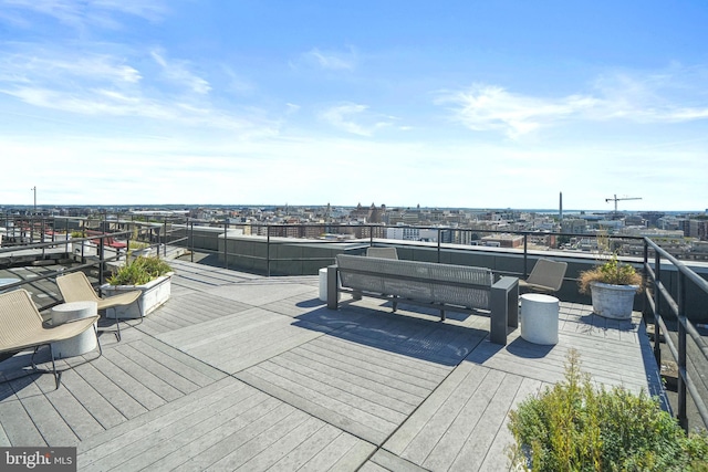 wooden deck with an outdoor living space