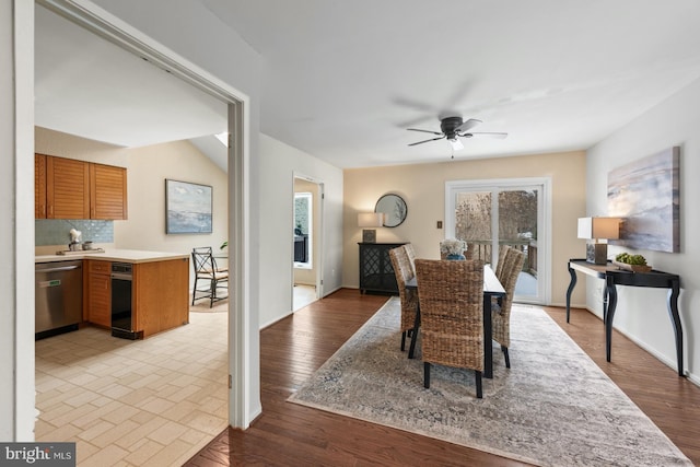 dining room with ceiling fan, light wood-type flooring, and a wealth of natural light