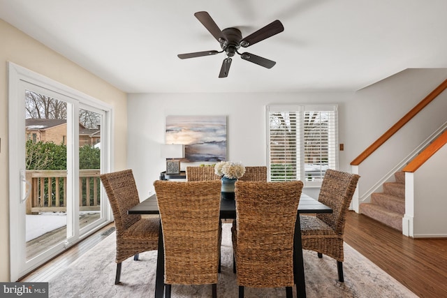 dining room featuring ceiling fan and hardwood / wood-style floors