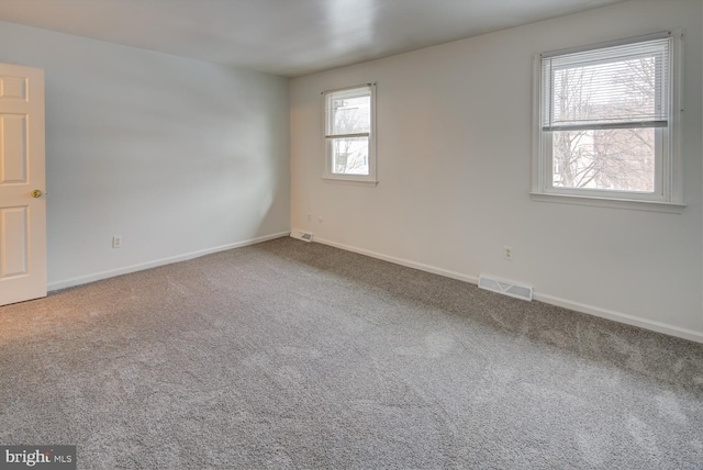 view of carpeted spare room