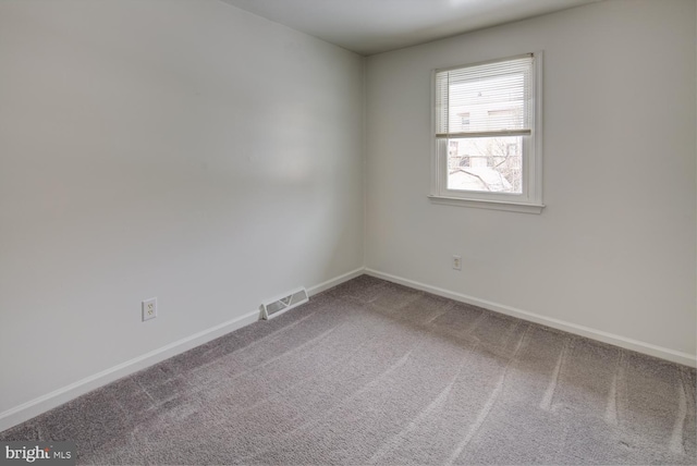 unfurnished room with carpet