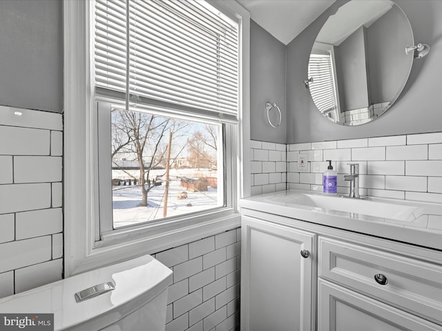 bathroom with toilet and vanity