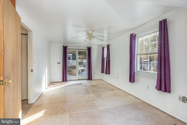 unfurnished room featuring ceiling fan