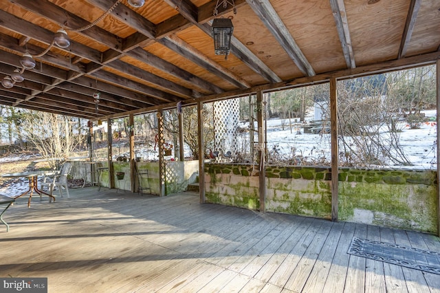 view of snow covered deck