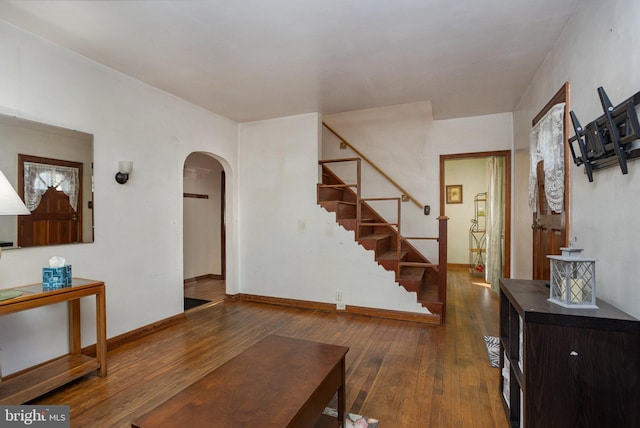 foyer with dark hardwood / wood-style floors