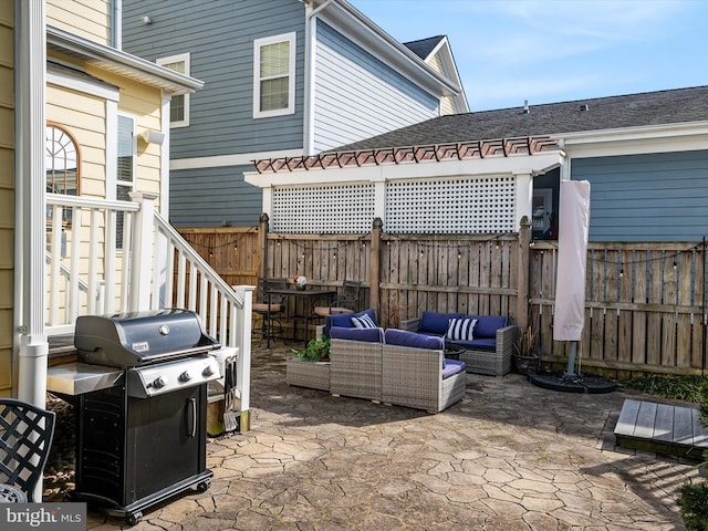 view of patio / terrace with an outdoor living space and grilling area