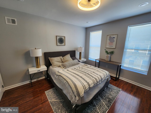 bedroom featuring dark hardwood / wood-style floors