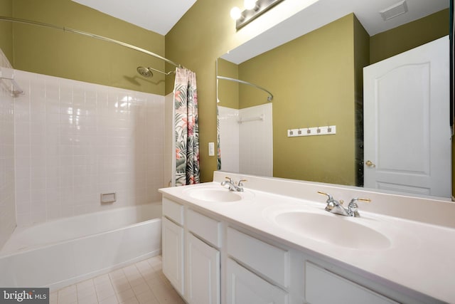 full bathroom with tile patterned flooring, shower / bathtub combination with curtain, visible vents, and a sink