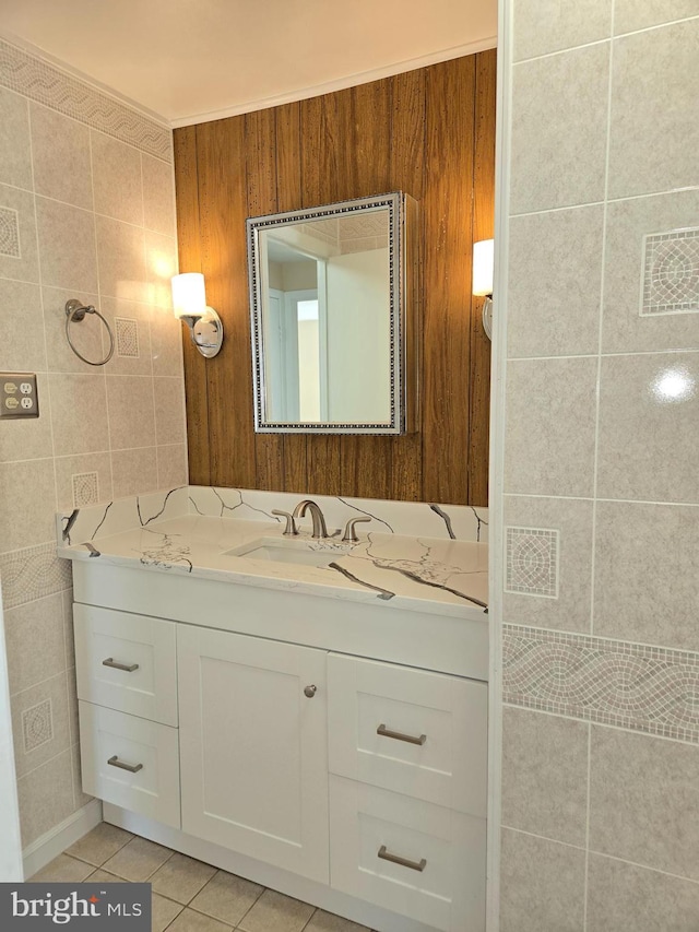 bathroom with vanity, tile walls, and tile patterned floors